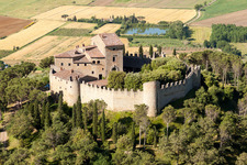 Aerial view of Castle of the fortress Castello di Montegualandro on lake Trasemino in Montecchio in Umbria, Italy