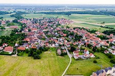 Village - view on the edge of agricultural fields and farmland in Rountzenheim in Grand Est, France