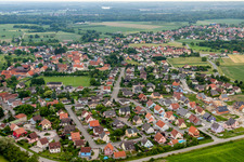 Village - view on the edge of agricultural fields and farmland in Stattmatten in Grand Est, France