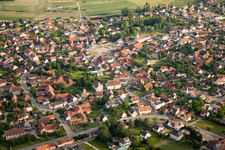 Village - view on the edge of agricultural fields and farmland in Kilstett in Grand Est, France