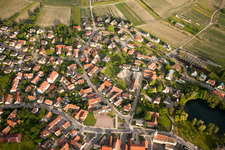 Village - view on the edge of agricultural fields and farmland in Gambsheim in Grand Est, France
