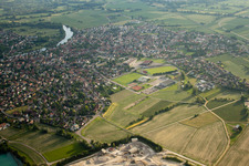 Oblique view of Terrain and overburden areas of the Gravière open-cast gravel mine at the quarry lake in La Wantzenau in the state Bas-Rhin, France