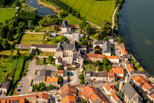 Aerial view of Building complex in the park of the castle at shore of the Mosel river in Rettel in Grand Est, France