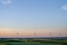 Wind turbine windmills on a field in Herxheimweyher in the state Rhineland-Palatinate