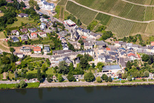 Town with the European Museum Schengen between the banks of the river of the river Mosel and steep Wineyards in Schengen in Grevenmacher, Luxembourg