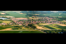 Panoramic perspective Village - view on the edge of agricultural fields and farmland in Rountzenheim in Grand Est, France