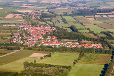 Aerial view of Village - view on the edge of agricultural fields and farmland in Winden in the state Rhineland-Palatinate, Germany