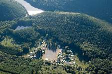 Aerial view of Nature camping “Am Berwartstein” at the Seehofweiher in Erlenbach bei Dahn in the state Rhineland-Palatinate, Germany