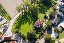 Aerial view of Villa am Mühlbach. Theodor Walz Art and Customer Mill in the district Erlach in Renchen in the state Baden-Wuerttemberg, Germany