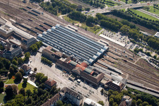 Track progress and building of the main station of the railway in Karlsruhe in the state Baden-Wurttemberg viewn from the air