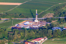 Oblique view of Construction site for drilling the geothermal plant on the A65, 2nd borehole in Insheim in the state Rhineland-Palatinate, Germany