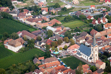 Aerial view of Church building St. Peter and Paul in the village of in Edesheim in the state Rhineland-Palatinate