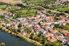 Town on the banks of the river of Mosel with St. Magaretha Kirche in the district Besch in Perl in the state Saarland, Germany