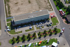 Oblique view of Daimler / Mercedes-Benz Global Logistics Center GLC on the island of Grün in Germersheim in the state Rhineland-Palatinate, Germany