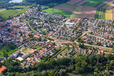 Railway line through the village in the district Sondernheim in Germersheim in the state Rhineland-Palatinate, Germany