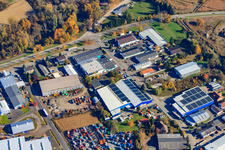 Oblique view of Industrial area Industriestraße with AG AUTOMOBILE VEHICLE PREPARATION - TIRE SERVICE - VEHICLE PURCHASE STATION - CAR DEALERSHIP - REGISTRATION SERVICE in Hagenbach in the state Rhineland-Palatinate, Germany