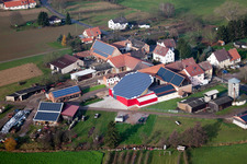Aerial view of Panel rows of photovoltaic turnable roof of a stable in the district Deutschhof in Kapellen-Drusweiler in the state Rhineland-Palatinate