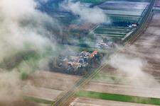 Höfen district in winter under clouds in the district Minderslachen in Kandel in the state Rhineland-Palatinate, Germany