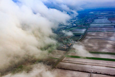 Aerial view of Höfen district in winter under clouds in the district Minderslachen in Kandel in the state Rhineland-Palatinate, Germany