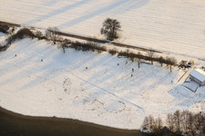 Johanneswiesen recreation area in winter with snow in Jockgrim in the state Rhineland-Palatinate, Germany