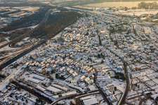 Luitpoldstraße in winter with snow in Wörth am Rhein in the state Rhineland-Palatinate, Germany