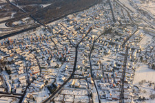 Aerial view of Bahnhofstraße in winter with snow in Wörth am Rhein in the state Rhineland-Palatinate, Germany