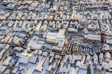 Christmas market at Plätzl and around St. George's Church in snow in Kandel in the state Rhineland-Palatinate, Germany out of the air