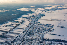 Oblique view of Saarstraße in winter with snow in Kandel in the state Rhineland-Palatinate, Germany