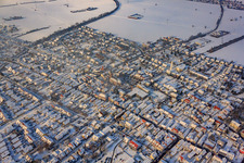 Aerial photograpy of Christmas market at Plätzl and around St. George's Church in snow in Kandel in the state Rhineland-Palatinate, Germany
