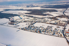 Aerial view of In winter when there is snow in the district Minderslachen in Kandel in the state Rhineland-Palatinate, Germany