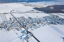 Winter snow-covered village view in Erlenbach bei Kandel in the state Rhineland-Palatinate, Germany