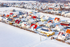 New development area Brotäcker in winter with snow in Steinweiler in the state Rhineland-Palatinate, Germany from above