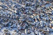 Dorbrunnenstraße in snow in winter in the district Büchelberg in Wörth am Rhein in the state Rhineland-Palatinate, Germany