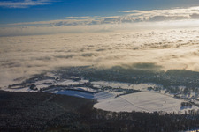 Aerial view of District landfill in snow in winter in Berg in the state Rhineland-Palatinate, Germany