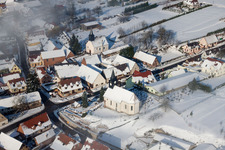 Wintry snowy Church building Eglise protestante de Wintzenbach in Wintzenbach in Grand Est, France
