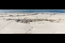 Wintry snowy Panorama perspective of Village - view on the edge of agricultural fields and farmland in Siegen in Grand Est, France