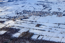 Village view from the south in snow in winter in Kapsweyer in the state Rhineland-Palatinate, Germany