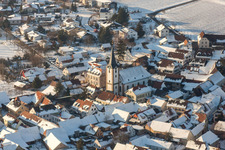 Wintry snowy Church building in of Evangelischen Kirche Old Town- center of downtown in the district Moerzheim in Landau in der Pfalz in the state Rhineland-Palatinate, Germany