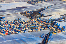 Aerial view of Village view from the south in snow in winter in the district Wollmesheim in Landau in der Pfalz in the state Rhineland-Palatinate, Germany