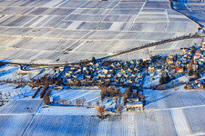 Village view from the south in snow in winter in the district Wollmesheim in Landau in der Pfalz in the state Rhineland-Palatinate, Germany from above
