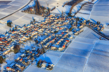 Village view from the southwest in snow in winter in the district Wollmesheim in Landau in der Pfalz in the state Rhineland-Palatinate, Germany