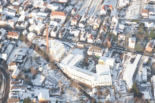 Winterly Town View of the streets and houses of the residential areas in Albersweiler in the state Rhineland-Palatinate out of the air