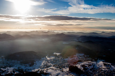 Wintry snowy Forest and mountain scenery of Pfaelzerwald in Gossersweiler-Stein in the state Rhineland-Palatinate, Germany