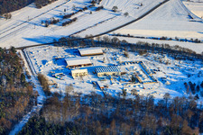 Sawmill in snow in winter in Hagenbach in the state Rhineland-Palatinate, Germany