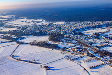 Village view in snow in winter from the east in Berg in the state Rhineland-Palatinate, Germany