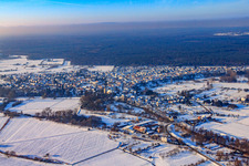 Aerial view of Village view in snow in winter from the east in Berg in the state Rhineland-Palatinate, Germany