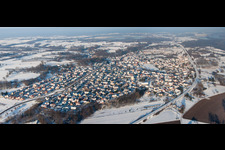 Aerial view of Wintry snowy Town View of the streets and houses of the residential areas in Mothern in Grand Est, France