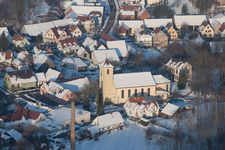 Drone recording of In winter when there is snow in Neewiller-près-Lauterbourg in the state Bas-Rhin, France