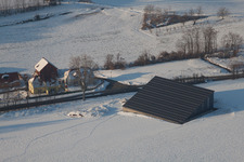 In winter when there is snow in Neewiller-près-Lauterbourg in the state Bas-Rhin, France from above