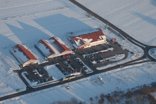 Shopping center on the border in winter in the district Neulauterburg in Berg in the state Rhineland-Palatinate, Germany